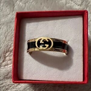 Fashion Jewelry Gold and Black Logo Accent Ring